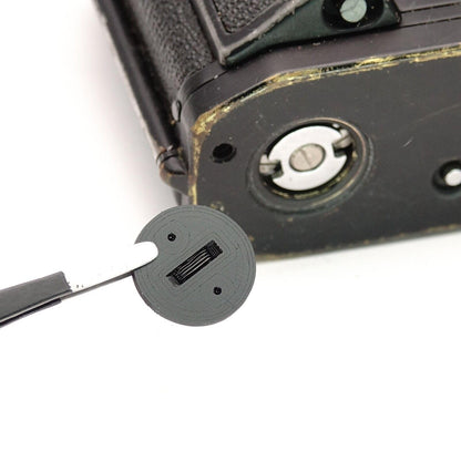 Cache de manivelle pour Canon New F-1